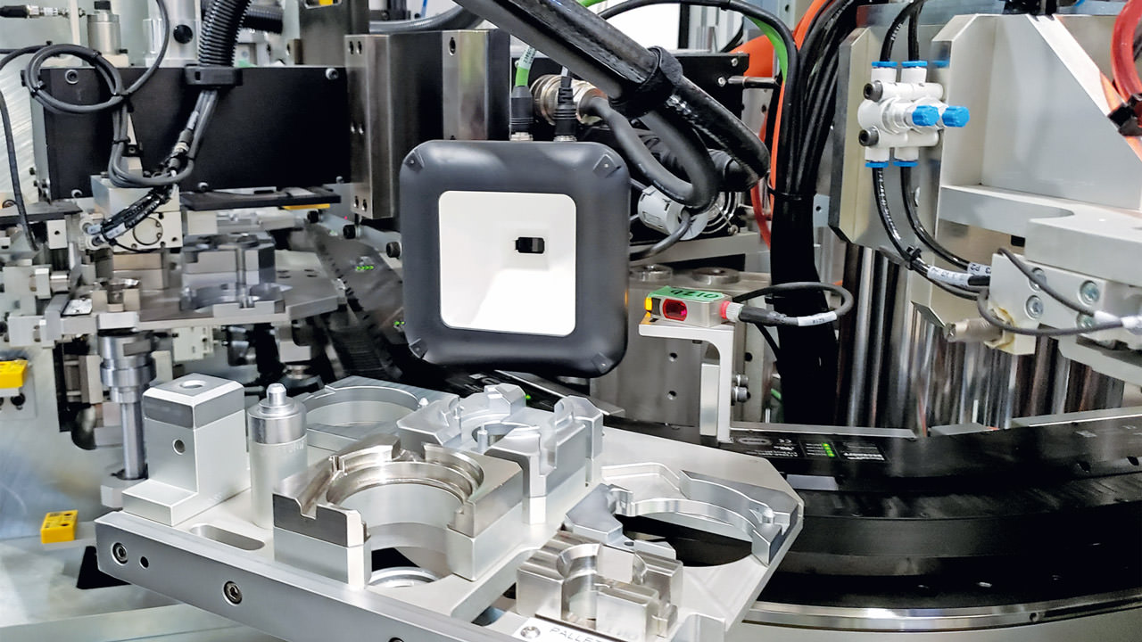 The system’s pallet-type workpiece carriers, which attach to XTS movers, can be swapped out to assemble a different part without having to purge the system. Picture: © Eclipse Automation